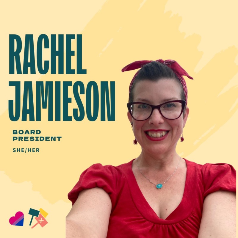 A woman wearing a red shirt and red hair bow smiles at the camera. Her name is displayed in green over a yellow background, along with a heart in the bisexual pride colors and protest signs.